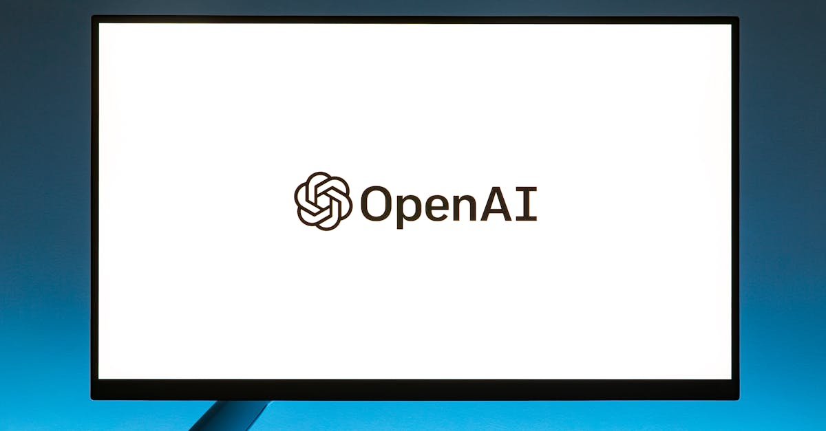 Minimalistic display of OpenAI logo on a monitor with a gradient blue background, representing modern technology.